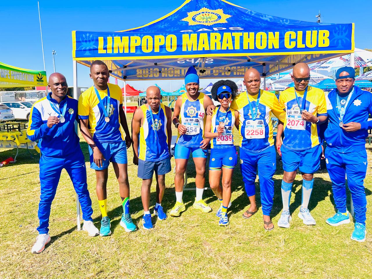 MEN AND WOMEN IN BLUE STRIVE FOR FITNESS